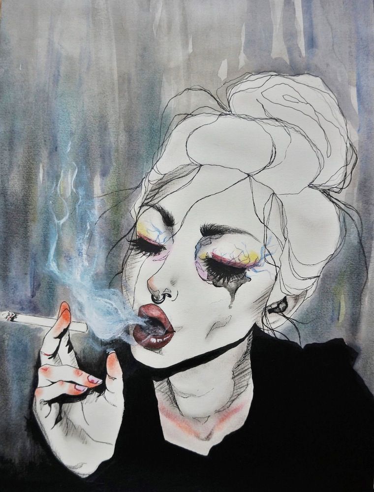 Mujer triste fumando